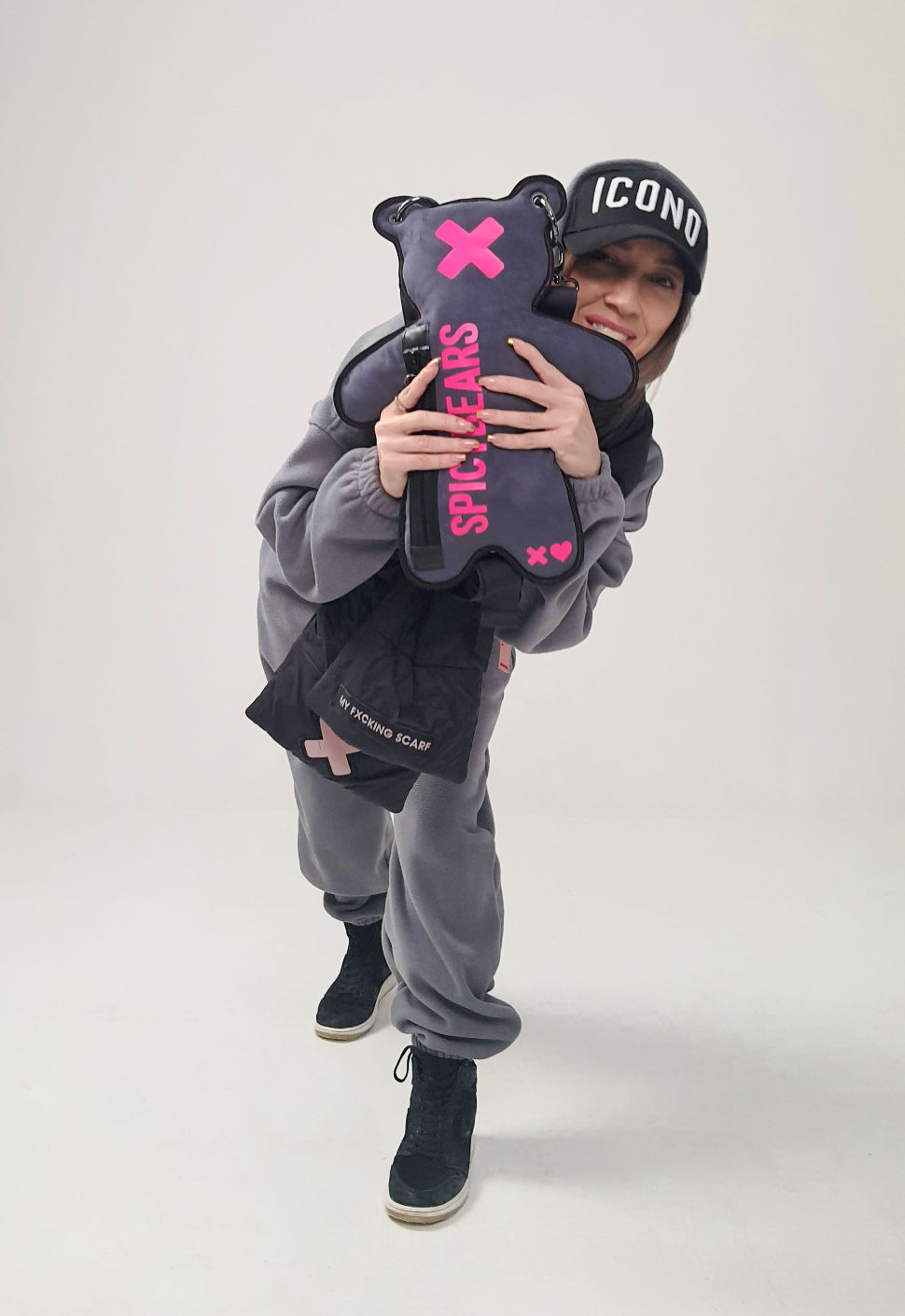 the huggable texture of this gray faux suede bear-shaped purse with neon pink velvet print, perfect for any fashion-forward streetwear lover