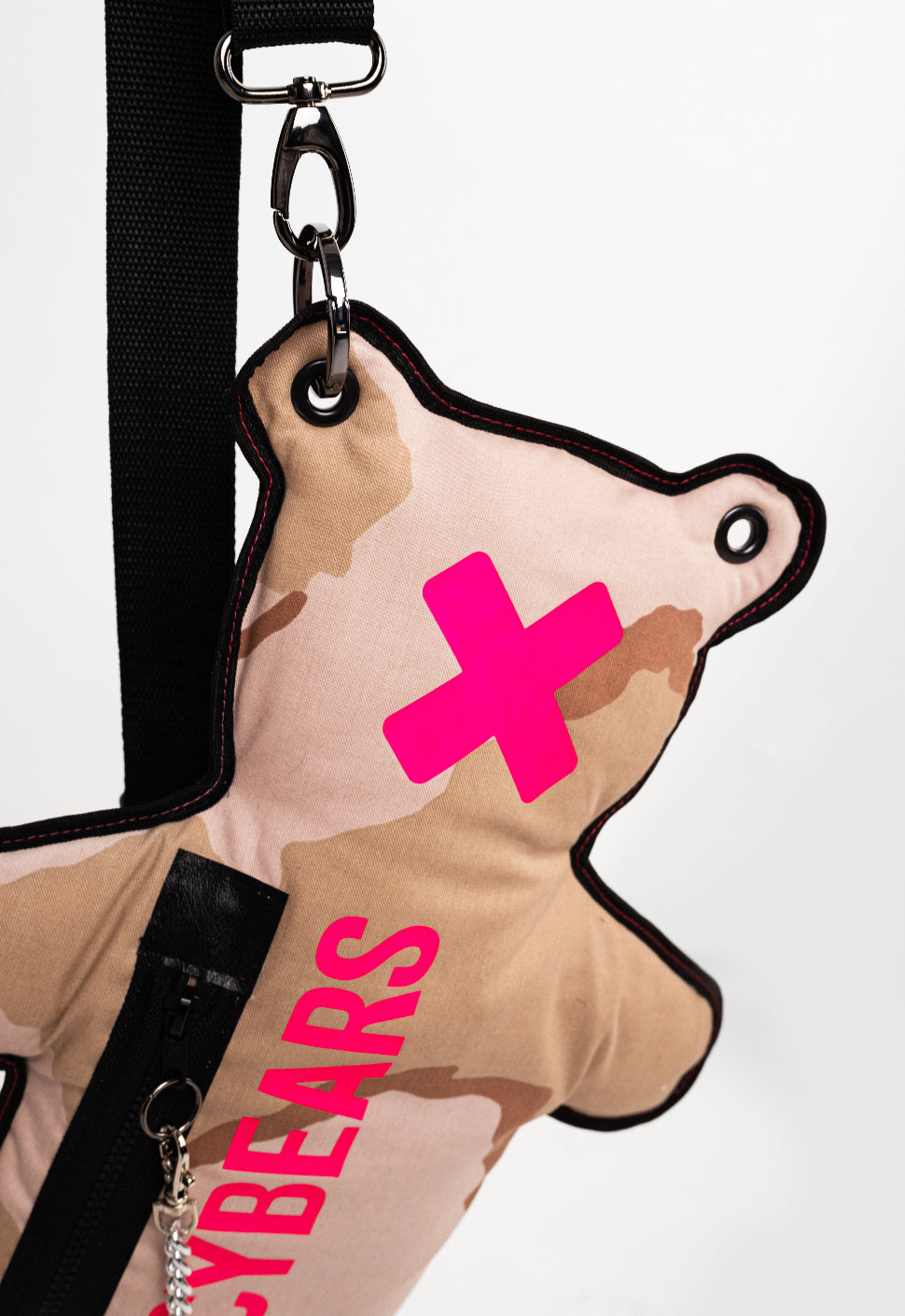 Combining camo streetwear with a pop of color, this bag is a must-have for fashion-forward individuals
